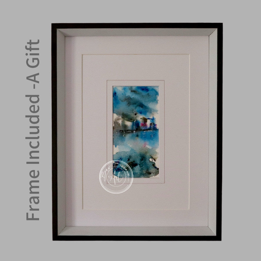 Modern abstract art: a textured blue and white watercolour wash with a suggestion of landscape, presented in a black frame.