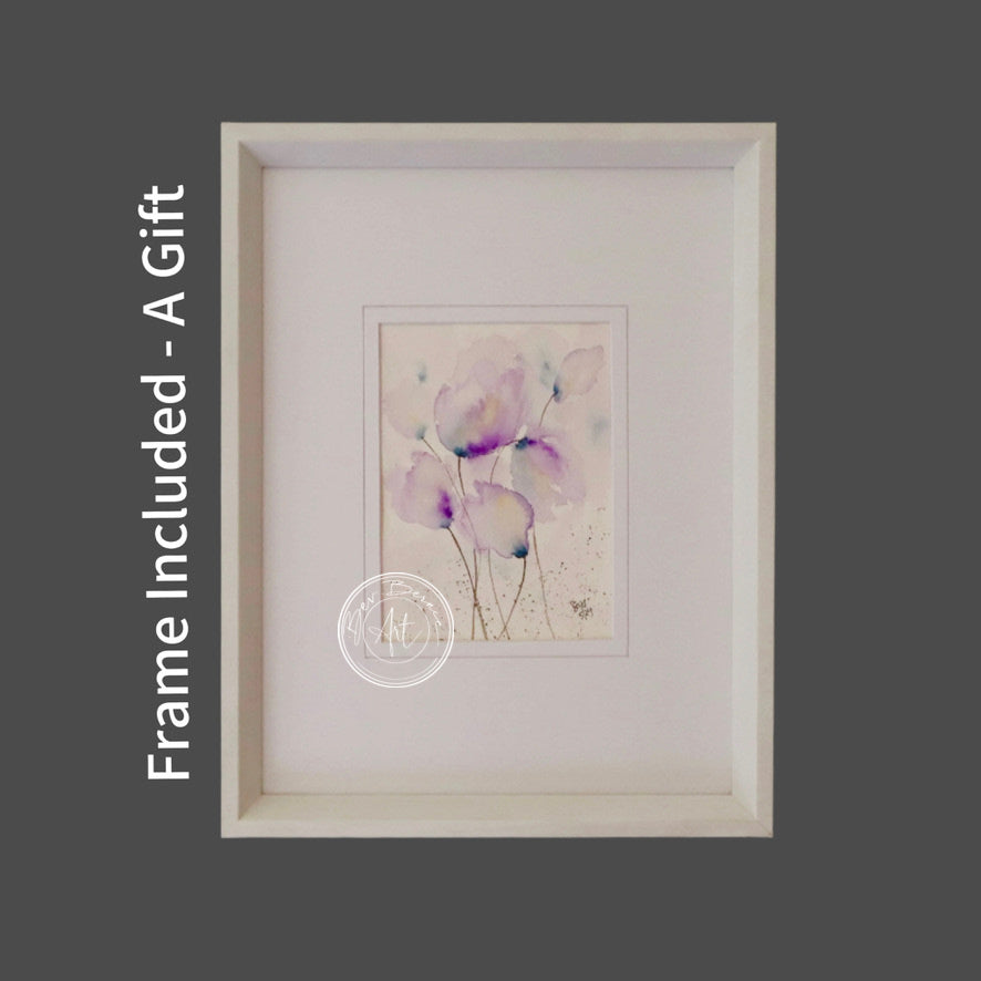 Watercolour painting of stylised, translucent purple flowers with hints of blue and pink on a textured, off-white background, framed in a white frame with a white mat.
