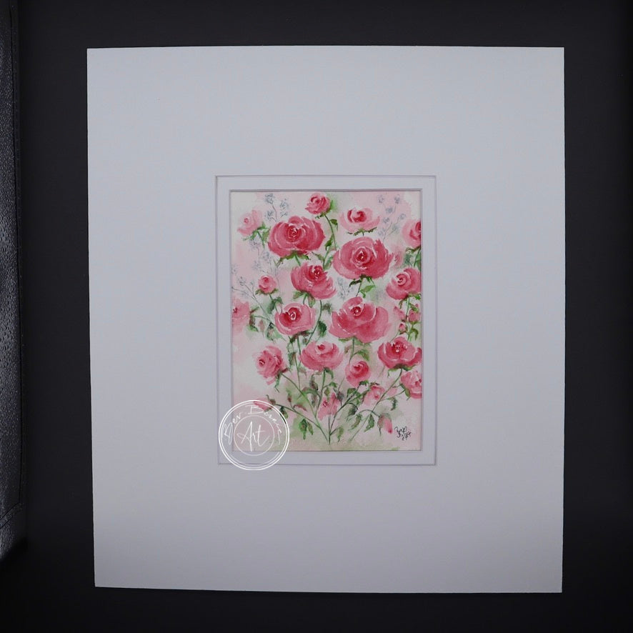 Main view of Rose Serenade, featuring a vibrant bouquet of pink roses painted in watercolour, mounted in a white mat.