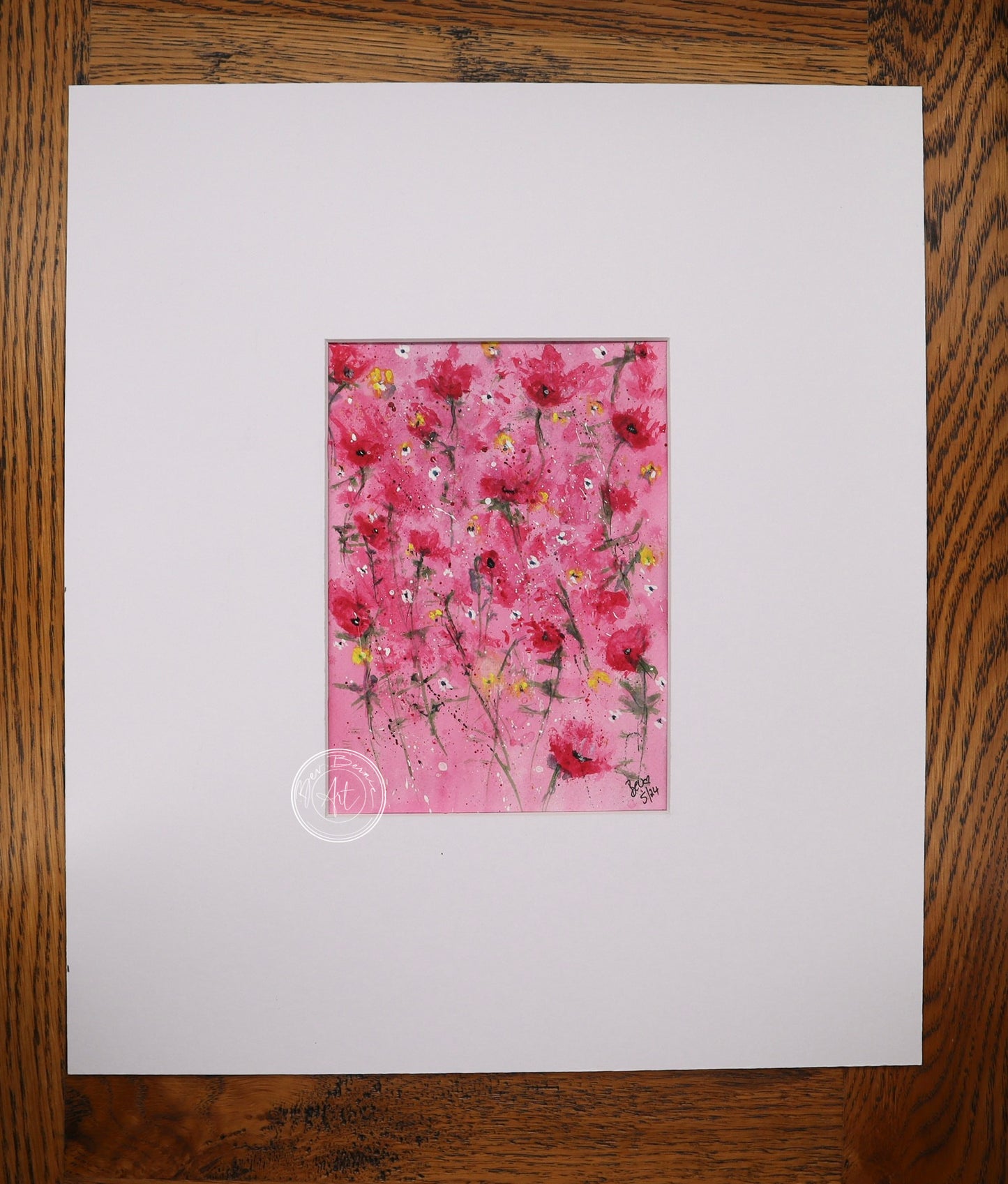 Watercolour painting of red poppies with yellow centres scattered across a bright pink background.