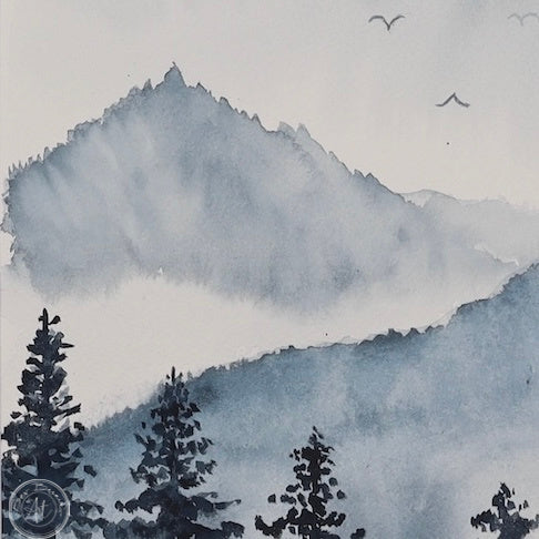 Watercolour painting of a misty mountain landscape with dark evergreen trees in the foreground and hazy blue mountains in the background.