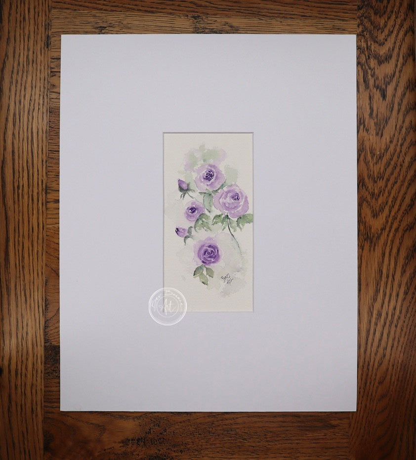Watercolour painting of a cluster of purple roses with green leaves and a single closed bud, set against a soft, hazy grey-purple background.