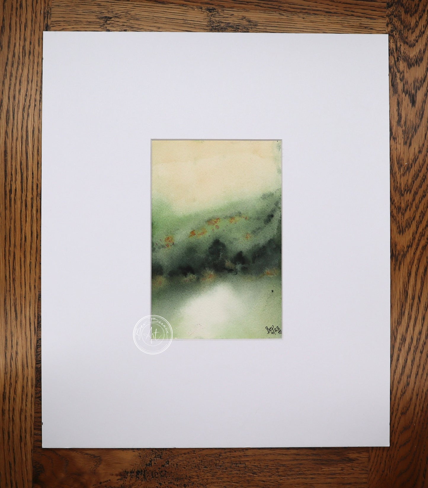 Watercolour painting of a hazy green landscape with rolling hills, a faint yellow sky, and touches of orange in the foliage.