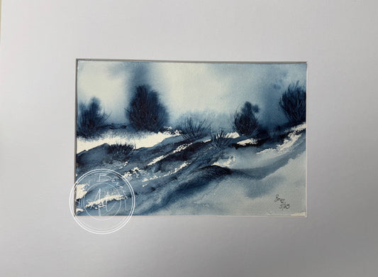 Image of a blue landscape with bushes 