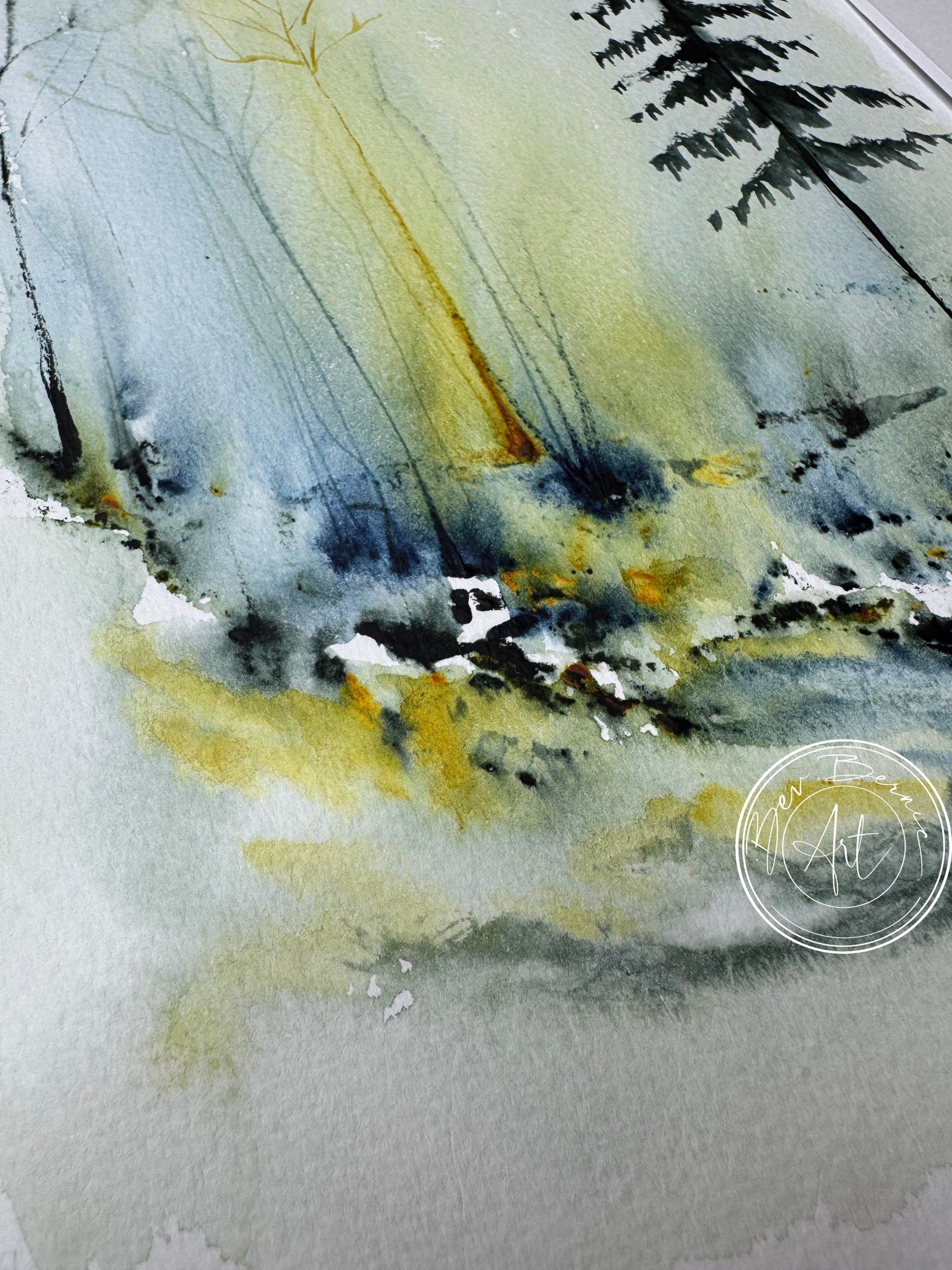 Abstract art with yellow, black, and gray colors on a textured surface.