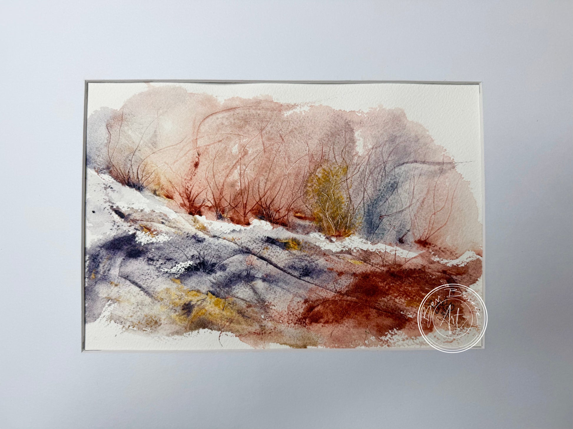 Abstract art piece with earthy tones on a light gray background