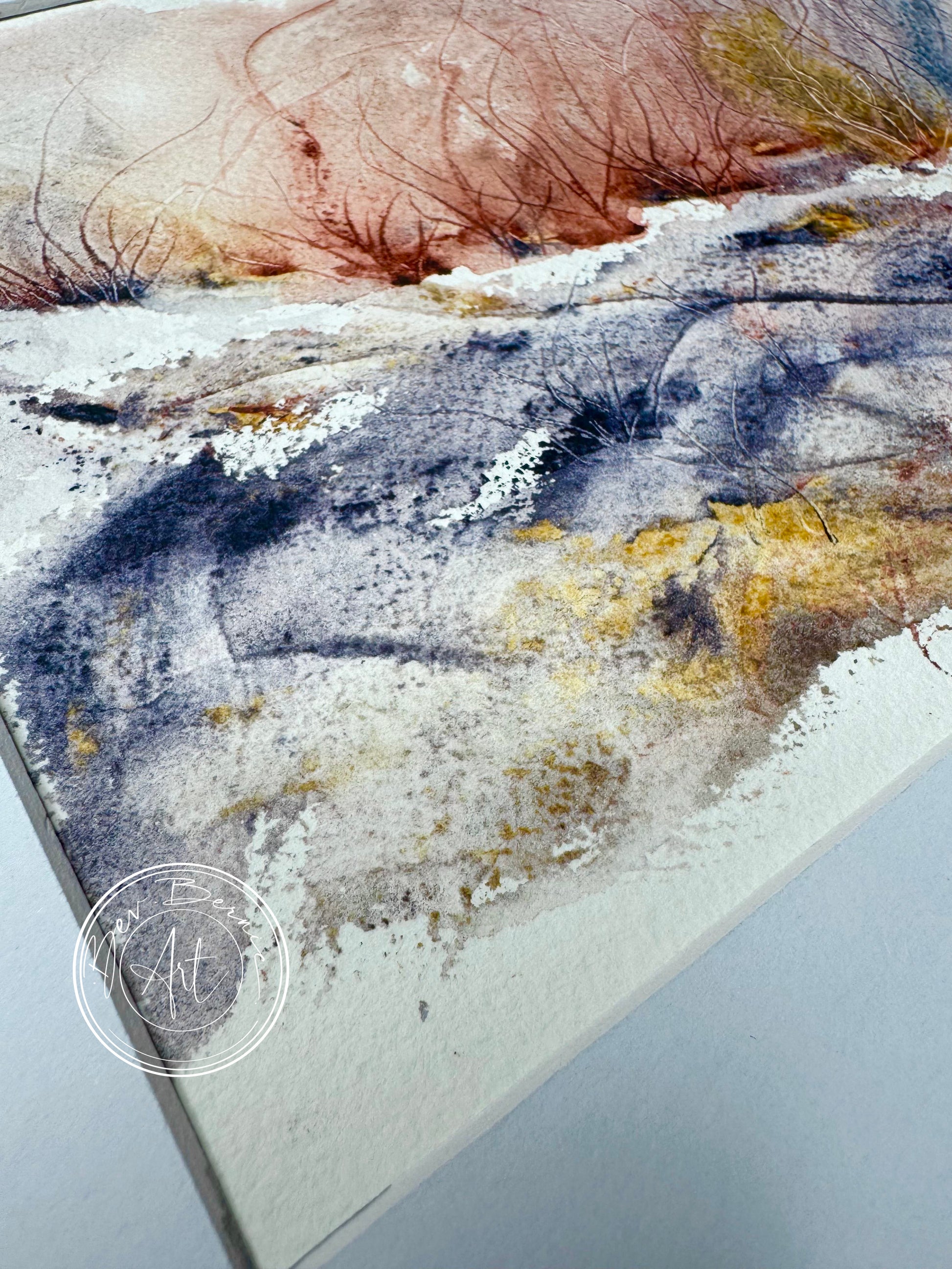 Abstract art piece with a mix of blue, yellow, and white on a textured surface.