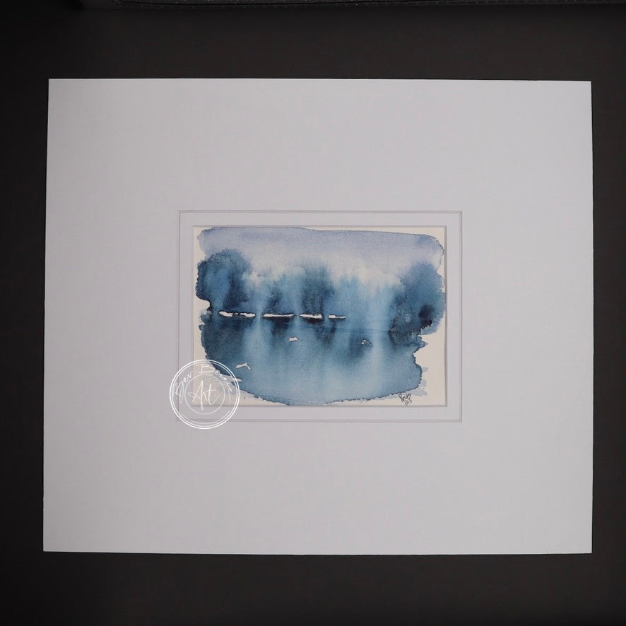 Main view of Reflections in Blue, featuring a serene abstract watercolour design in shades of blue, mounted in a white mat.