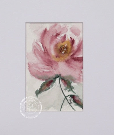 Watercolour painting of a single pink flower with a golden centre, green leaves, and a delicate stem against a light grey background.